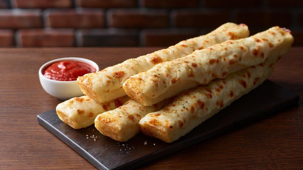 Cheese Sticks · 5 breadsticks topped with melted cheese and sprinkled with Italian seasoning. Served with marinara dipping sauce.