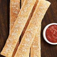Breadsticks · 5 breadsticks seasoned with garlic and parmesan. Served with marinara dipping sauce.