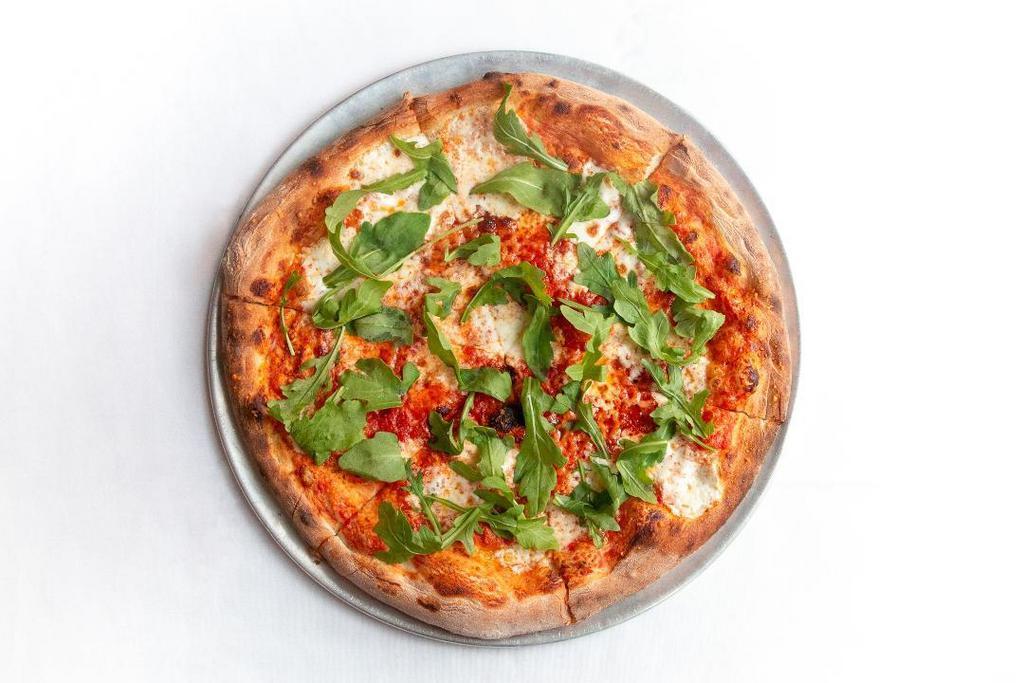 Prosciutto & Arugula Pizza · house made mozzarella, prosciutto di parma, tomato, basil, arugula
