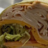 Honey Turkey Wrap · Honey maple turkey, Swiss cheese, lettuce, tomato and honey mustard on a whole-wheat wrap.