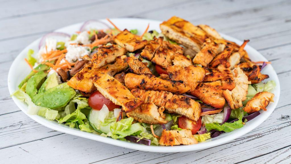 Grilled Chicken Salad · Chopped chicken, romaine lettuce, tomato, cucumber, carrots, olives, dressing.