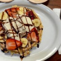 Belgian Waffle Sunday · choice of vanilla, or chocolate ice cream with banana & strawberrys