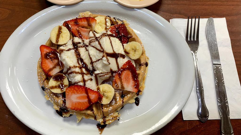 Belgian Waffle Sunday · choice of vanilla, or chocolate ice cream with banana & strawberrys