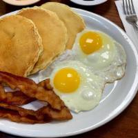 Pancakes With Two Eggs And Bacon · 