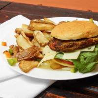Veggie Burger · Veggie patty, lettuce, tomato ,mayonnaise ,ketchup, on potato bun.