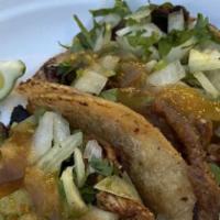 Pina Pork Taco · With onion, cilantro, and avocado sauce.