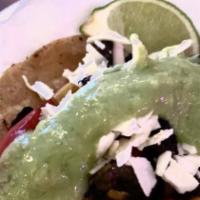 Vejetale Taco · With portobello mushrooms, corn, queso fresco, avocado sauce, and epazote leaf.