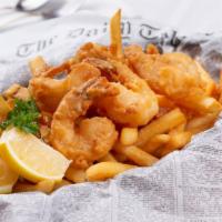 Shrimp Basket · Crispy golden shrimp served with fries.