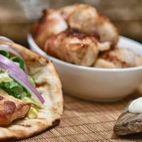 Chicken Bacon Souvlaki Sandwich · Marinated tender chunks of chicken fillet wrapped with bacon, served on a skewer in pita bre...