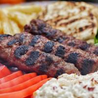 Beef Kebob Platter · Ground beef and lamb charcoal grilled (3), served with lettuce, tomatoes, onions, tzatziki,p...
