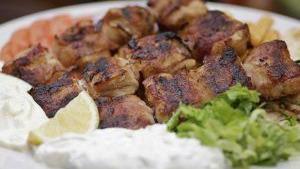 Chicken Bacon Platter · Three bacon-wrapped chicken skewers served with tomatoes, lettuce, onion, bz grill sauce, pi...