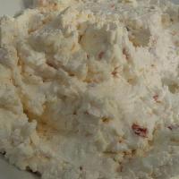 Kopanisti Spread · Ground feta cheese spread with red crushed peppers, olive oil and lemon juice. Served with p...