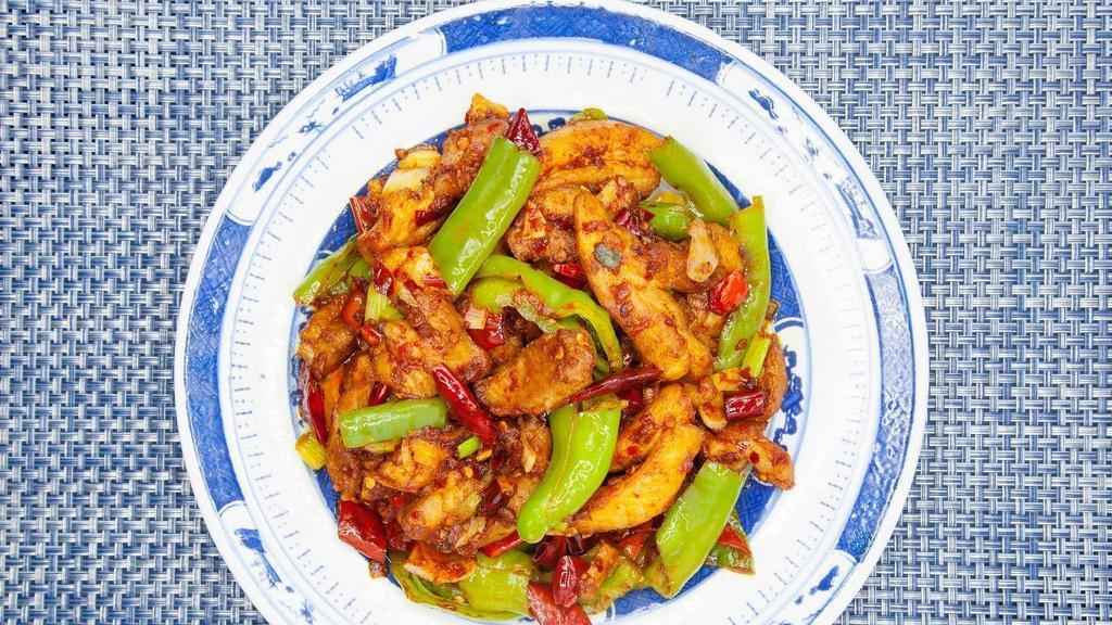 Three Pepper Chicken Lunch · Three types of peppers of five alarm heat,  come with rice