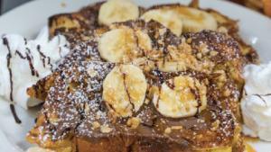 Oh My French Toast- Really Good! · French toast with nutella, bananas, and granola. Served w/ syrup and cinnamon butter on the ...