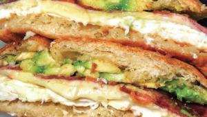 The Eye Opener Sandwich · Most popular. Egg whites, sliced avocado, turkey bacon, Pepper Jack cheese on a toasted croi...