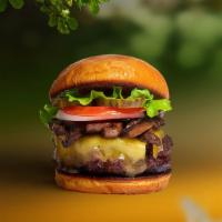 Vegan Mushroom & Cheese Burger · Seasoned vegan burger patty topped with mushrooms, melted vegan cheese, lettuce, tomato, oni...