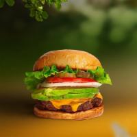 Vegan Avocado Burger · Seasoned vegan burger patty topped with avocado, melted vegan cheese, lettuce, tomato, onion...