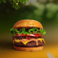 Vegan Classic Burger · Seasoned vegan burger patty topped with lettuce, tomato, onion, and pickles.
