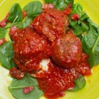 Polpette Della Mamma Beet · Meatballs in a tomato and basil sauce.