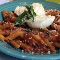 Penne Father John Mcguire · Penne in Vodka sauce with pancetta and smoked Mozzarella.