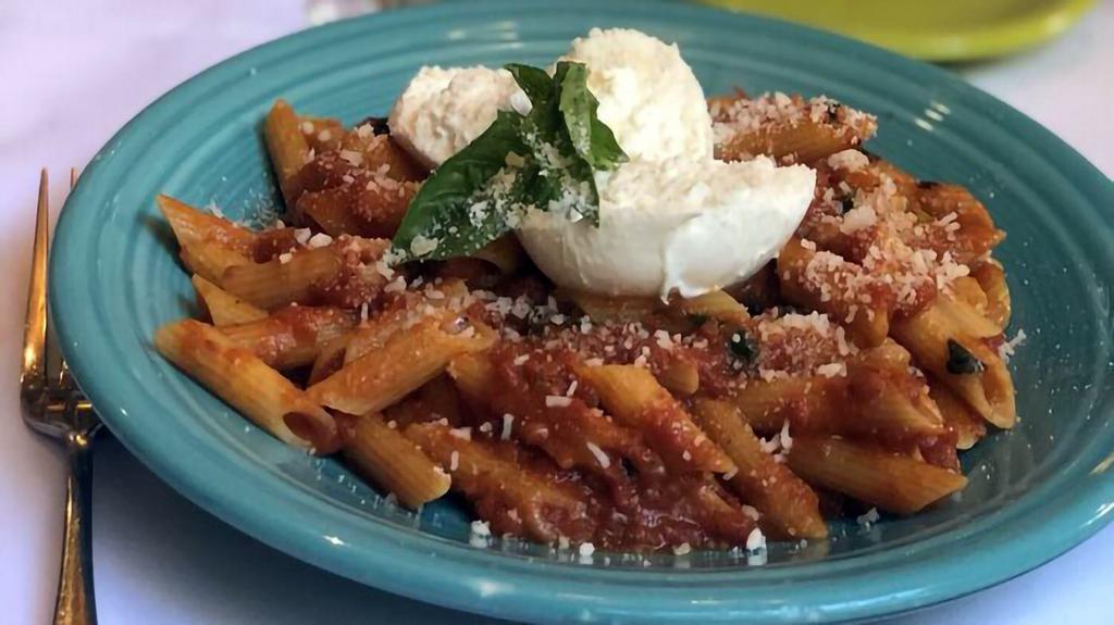 Penne Father John Mcguire · Penne in Vodka sauce with pancetta and smoked Mozzarella.