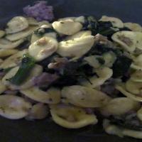 Orecchiette Alla Barese · Homemade ear shaped pasta with broccoli rabe, sausage and garlic.