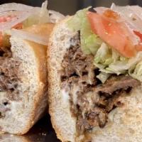 Philly Cheese Steak Sandwich · Steak cheese and caramelized onion sandwich.