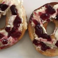 Bagel With Plain Cream Cheese & Grape Jelly · Boiled and baked round bread roll.