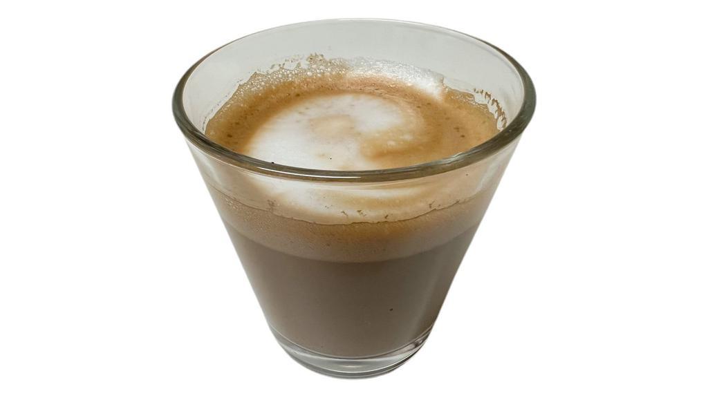 Macchiato · Espresso topped with a teaspoon dab of foam.