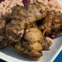 Jerk Chicken Bowl · Cubes of Boneless chicken and potatoes cooked in our jerk sauce until tender. Served with ri...