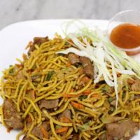 Chicken Chow Mein · Chicken stir-fried with cooked rice and seasonal vegetables.