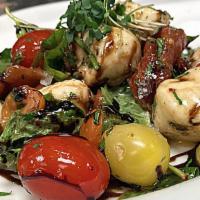 Ceprese Salad · Fresh Mozzarella, Heirloom Tomatoes, Basil, EVOO, Balsamic Vinegar