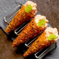 Spicy Tuna Cones · Sushi-grade tuna, wasabi tobiko, sesame miso tuile. (3 cones)