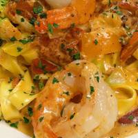 Drunken Shrimp · Vodka sauce, tagliatelle pasta, sautéed vegetables