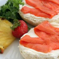 The Lox Cream Cheese Bagel · Lox classic bagel with salmon slices on bagel.