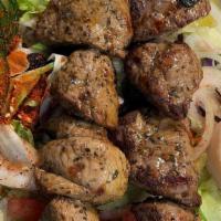 Lamb Salad · Fresh salad with romaine lettuce, mix lettuce, tomato, cucumber, radish, cabbage, green pepp...