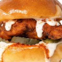 Nashville Hot Chicken · Nashville Crispy Chicken, Pepper Jack, Dill Pickles & Ranch.