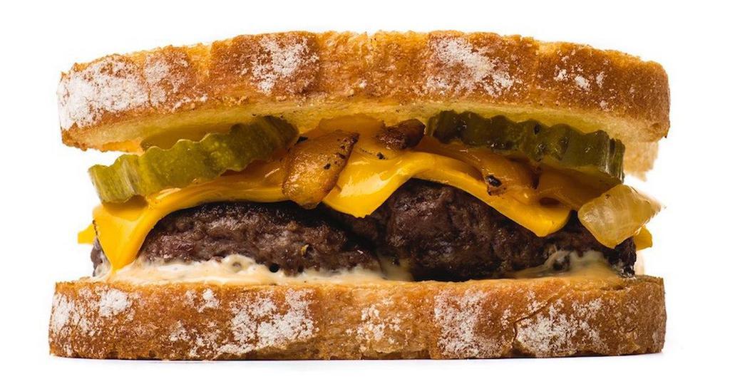 Burger Melt · American & NY Cheddar, Pickles & Burger Sauce.
