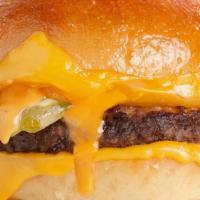 Cheeseburger · American & Aged Cheddar, Dill Pickles & Burger Sauce..