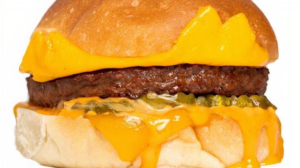 Beyond Cheeseburger · Beyond Meat Plant-Based Burger, Dill Pickles, American & Cheddar & Burger Sauce.