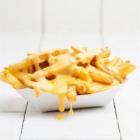 Cheesy Fries · CHEESE SAUCE ON FRIES.