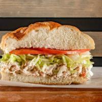 Tuna Salad Platter · Tuna Over Lettuce, Roasted Red Peppers, Tomato, Cucumbers, Pickles, Balsamic Vinegar.