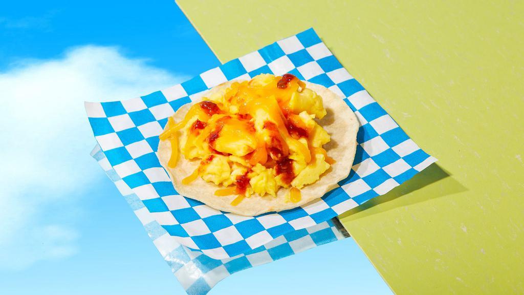 Egg And Cheese Taco · Eggs, melted cheese, salsa.