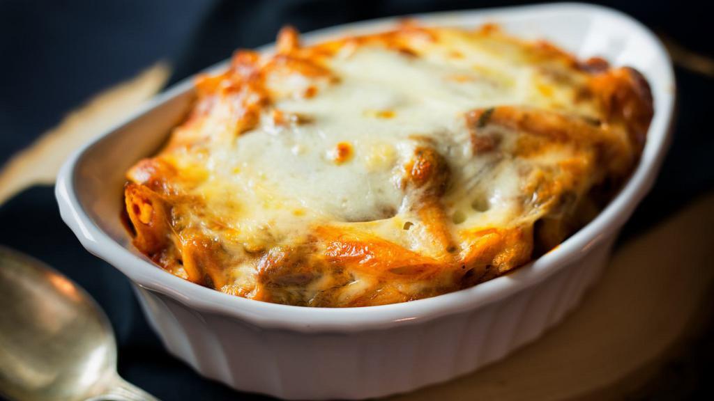Baked Ziti · Ziti pasta, our house marinara sauce and mozzarella cheese baked until bubbling and golden brown.