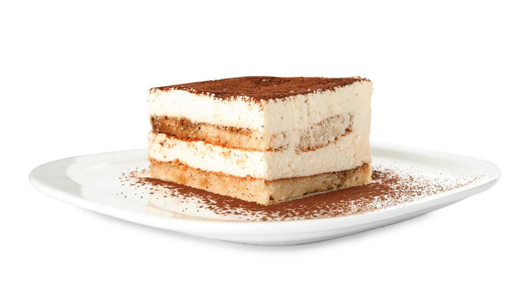 Tiramisu · Lady fingers delicately dipped in coffee and layered with a creamy mascarpone filling with a hint of cocoa.