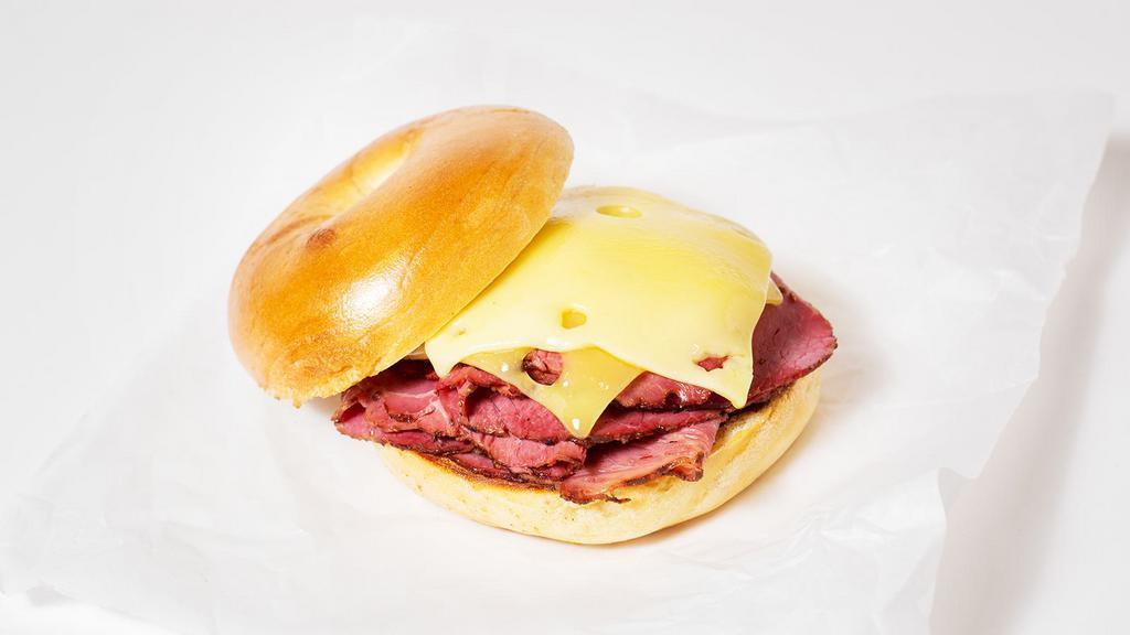 Reuben Bagel · Pastrami, melted swiss, sauerkraut, and thousand island dressing on your choice of bagel.