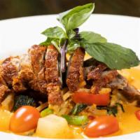 Duck Pineapple Curry · Gluten free, hot. With pineapple, tomato, basil bell pepper, bamboo and string bean in pinea...