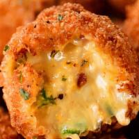Jalapenos & Cream Cheese Poppers · Six piece.