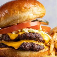 Kg Cheeseburger & Fries · Doubled-Stacked quarter pounders, lettuce, tomato, grilled onions, American cheese, special ...