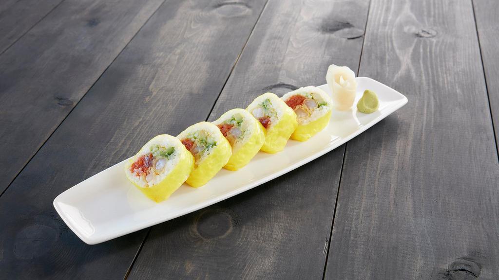 Wave · Spicy tuna, shrimp tempura, avocado, cucumber, soy paper.